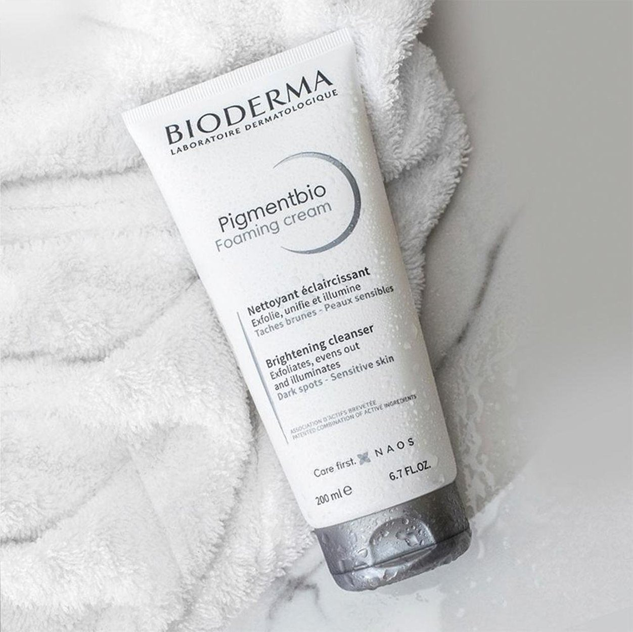 Bioderma Pigmentbio Foaming Cream bottle on a white towel