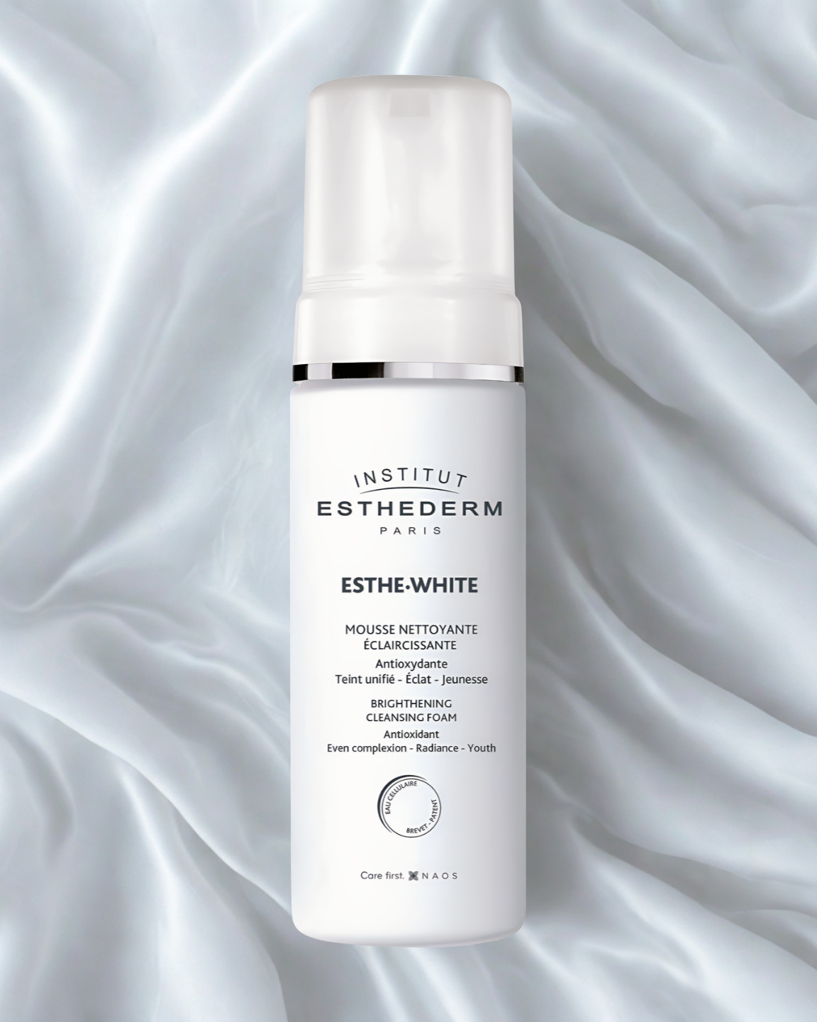 Institut Esthederm skincare product on a silver textured background